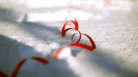 close-up. on the snow are multi-colored tinsel and confetti. christmas decorations. High quality photoの写真素材
