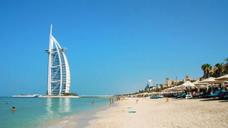 DUBAI, UNITED ARAB EMIRATES, UAE - NOVEMBER 20, 2017: Hotel Jumeirah Al Qasr, near Burj al Arab. View of the luxury beach and grand sail shaped Burj al Arab Hotel. High quality photoのeditorial素材