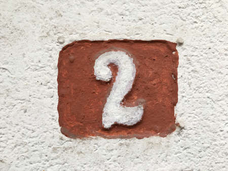 Vintage grunge square metal rusty plate of number of street addressの素材