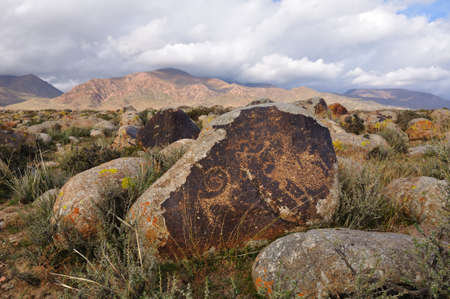 Valley Stones in Kyrgyz mountains and ancient petroglyphsの写真素材