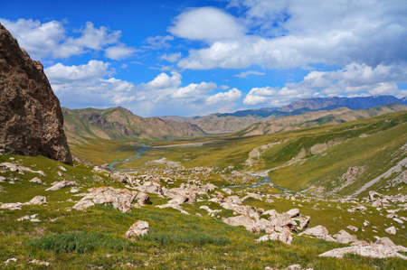 Picturesque hills and  river under the blue sky, Kyrgyzstanの写真素材