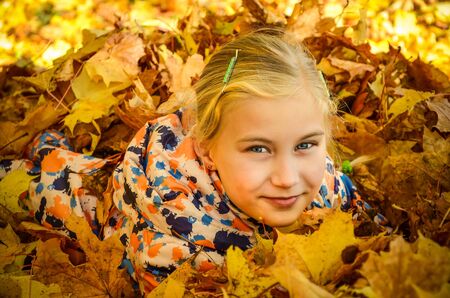 Close up photo of a little smiling girlの写真素材
