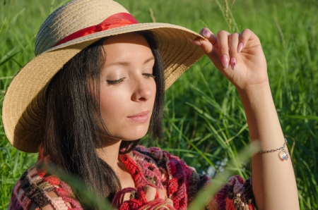 Vintage style photo of a young girl relaxingの写真素材