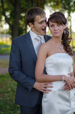 Classical newly wed couple  having funの写真素材