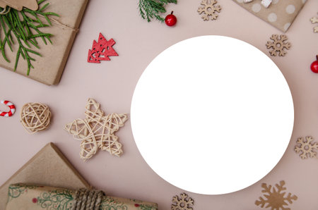 Christmas composition. Flat lay composition with Christmas decorations and white round ad space. Round mock up.の写真素材