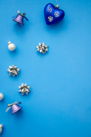 Christmas composition. A pattern of christmas balls and decorations on deep blue background. Flat lay, top view New year decor.の写真素材