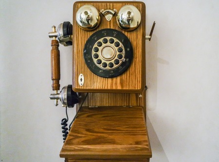 Vintage telephone made of wood, was shooted in Saint-Petersburg.の写真素材