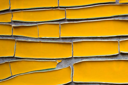 Yellow cracked paint texture background.