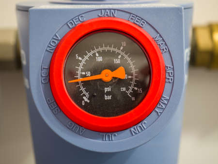 A pressure gauge showing the water pressure in the pipeline system in a private house.の写真素材