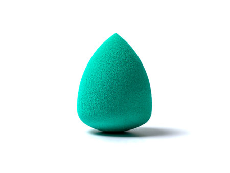 The makeup sponge allows you to evenly apply and blend cosmetics for a flawless finish. isolated on white background.の写真素材