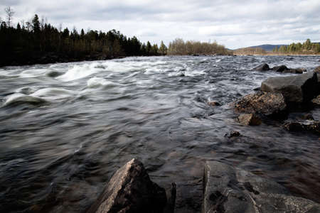 fast river flow - Lofoten Islands, Norwayの写真素材
