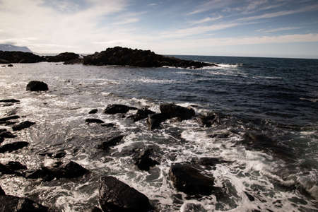 beat of waves on a beach on Lofoten Islandsの写真素材