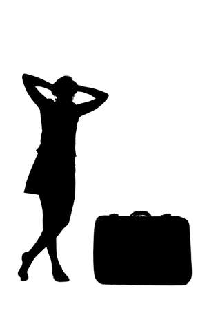 stressed woman silhouette - near a luggageの写真素材