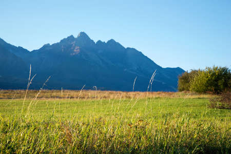 sunrise over mountain peaks viewの写真素材