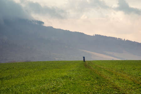 photographer silhouette at sunset, Tatra mountainsの写真素材