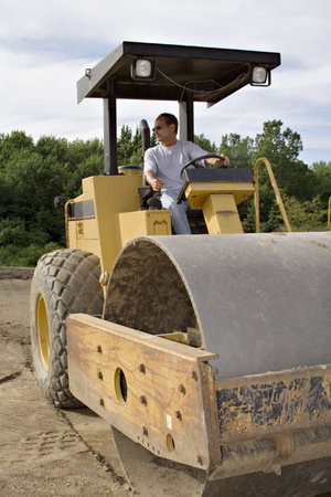 Large Construction Roller - man operating