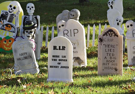 A graveyard decorating a lawn for Halloween.の写真素材