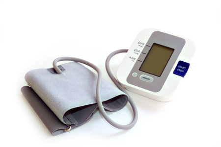 A home blood pressure machine on white background.