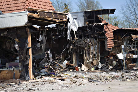 Fast food restaurant with fire damage and now is ready for demolition. の写真素材