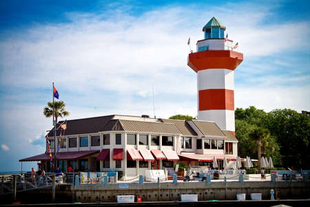 A lighthouse stands in Harbour Town, South Carolinaの写真素材