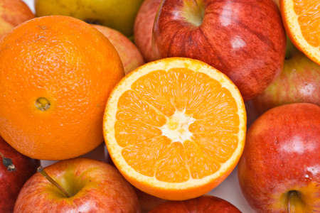 A fruit background of apples and oranges.の写真素材