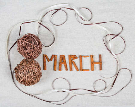Two coil in the form of a figure eight on a beige backgroundの写真素材