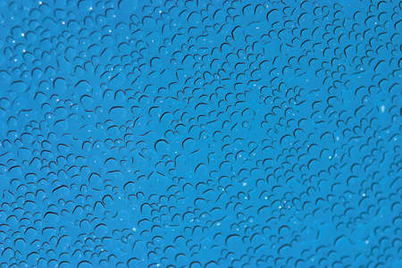 Raindrops on glass - specular highlights left for effectの写真素材