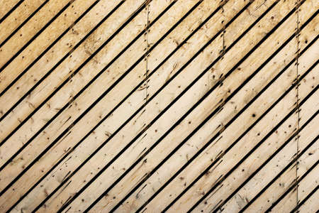 Diagonal wooden planks, slight grunge effect.の写真素材