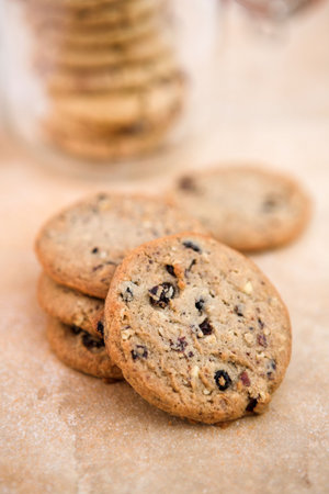Freshly made oven baked Blueberry & Oat cookies - shallow dofの写真素材