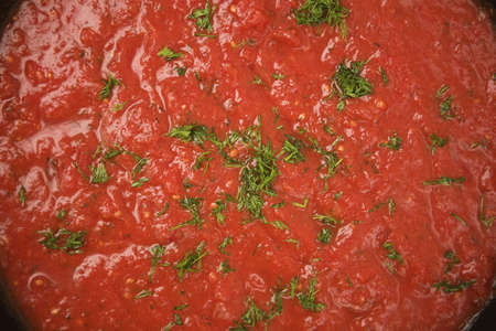 Close up of herb & tomato sauce - background style imageの写真素材