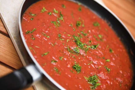 Sauce pan with homemade tomato pasta sauce - shallow dofの写真素材