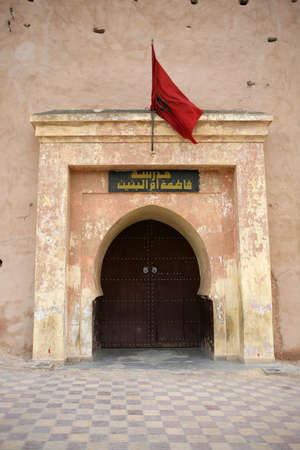 Doorway in Morocco with the Moroccan flag aboveの写真素材