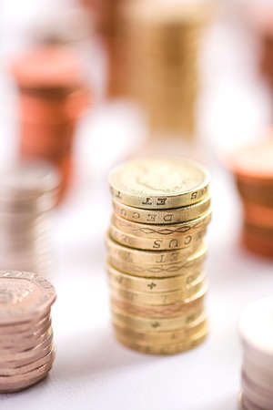 Stacks of GBP coins - shallow dofの写真素材