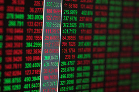 Close up of stocks & shares figures - some in the red & some in the green - shallow dofの写真素材