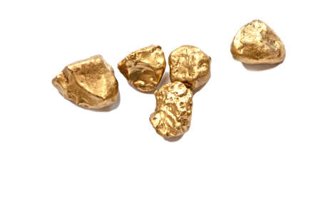 Five golde nugget on white background.の写真素材