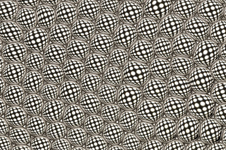 Many small black and white dots forms a pattern.