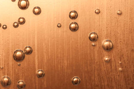 A nice golden glass of champagne with dewの写真素材