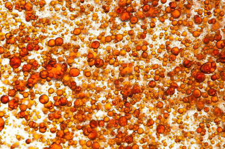 Many small yellov ond orange bubblesの写真素材