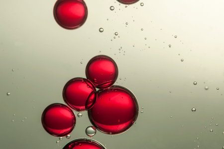 Nice red air bubbles soars over a blurred background