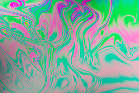 Many colors flows around and forms a beautiful patternの写真素材