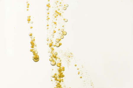 Golden fizz is isolated overa light backgroundの写真素材