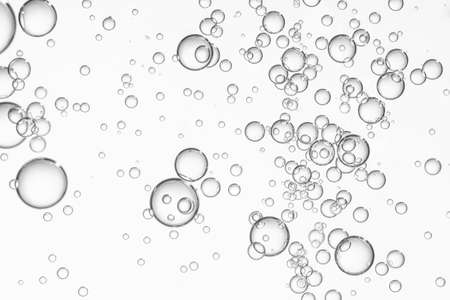 Sparkling water poured in a crystal glass.の写真素材