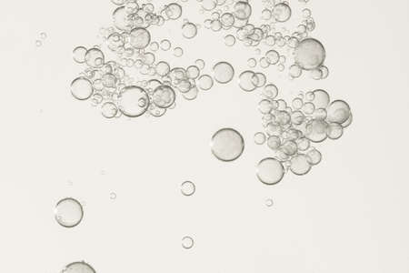 Pouring water create many small fizz bubbles.の写真素材