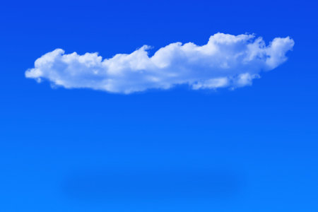 A large white cloud over a blue sky.
