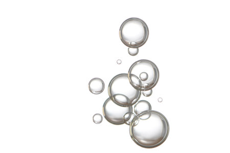 Sliver shiny water bubbles, isolated over a light grey background.の写真素材