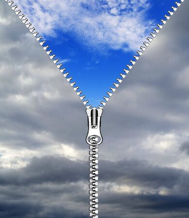 zipper opening blue skyの写真素材