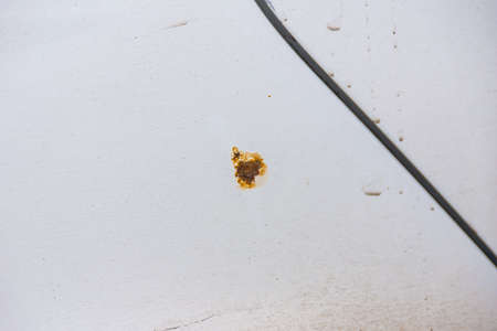 rust stain on the wing of a carの写真素材