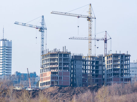 construction of a multi-storey frame-type building using tower cranes