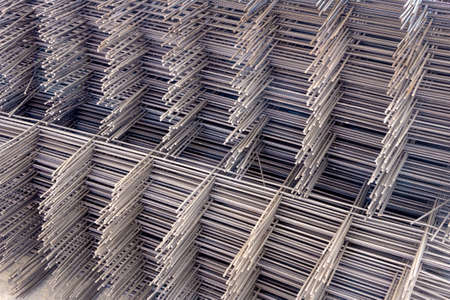 frame mesh of thin corrugated rod stacked vertically, selective focus and toningの写真素材