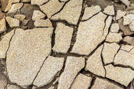 collapsed sandstone stone from absorbed atmospheric moisture and under the influence of sunlight, selective focusの写真素材